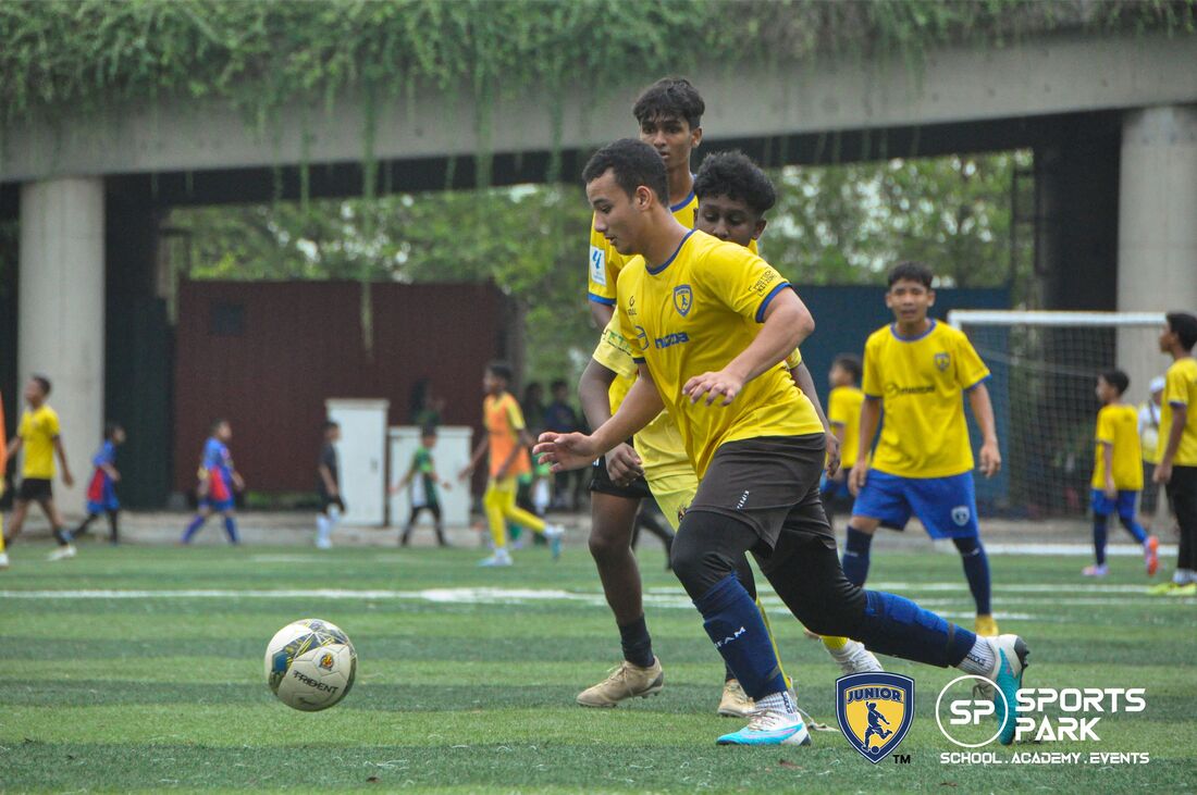 JuniorFam players competing in a football match